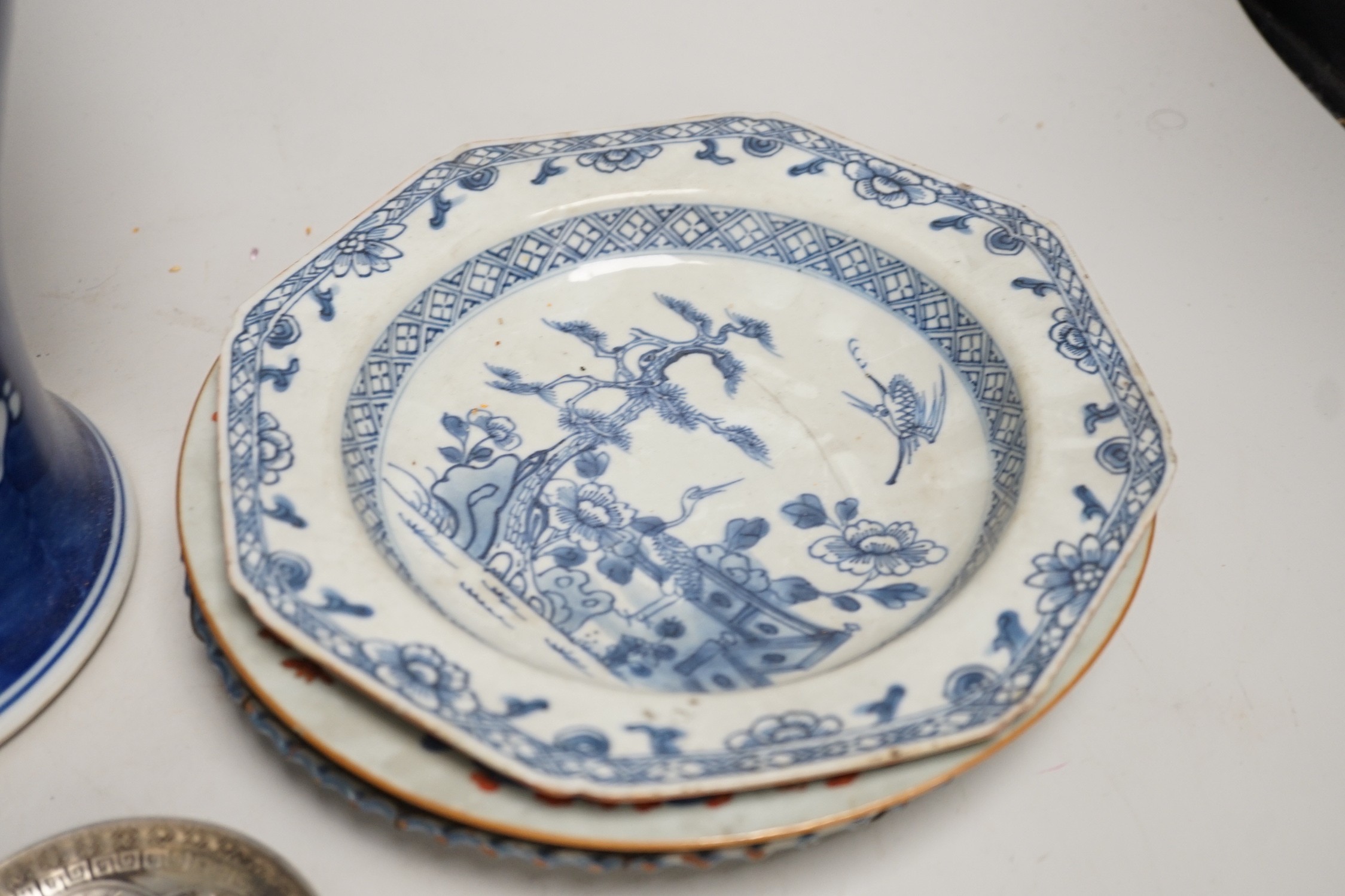 A large Chinese blue and white prunus vase, 46.5cm, together with Chinese export plates and oriental ceramics etc